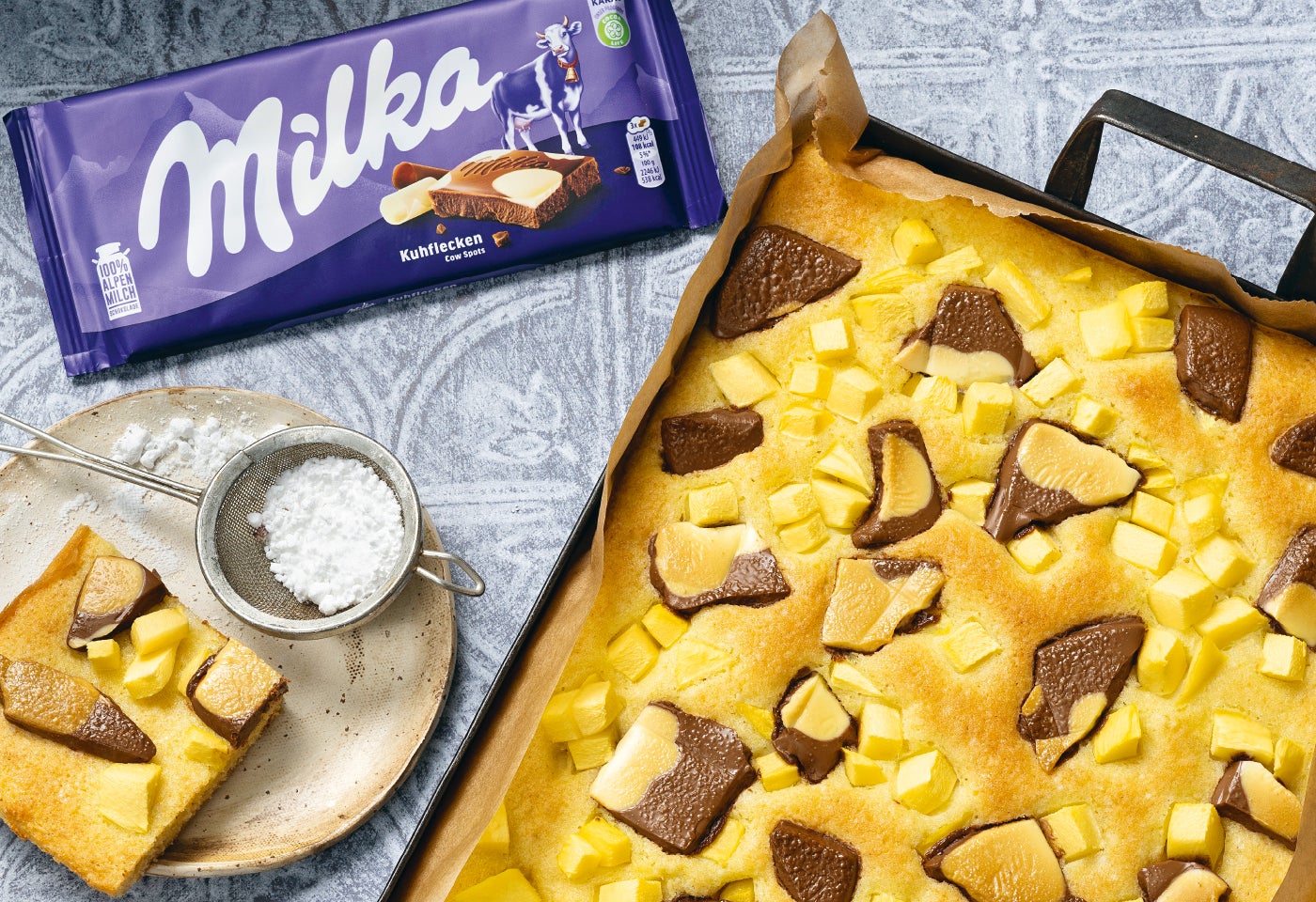 Blechkuchen mit Milka Kuhflecken-Schokolade und Mango | BILLA