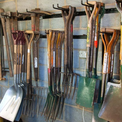 Spades, shovels and forks, cleaned and dried after use, and stored undercover