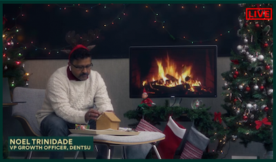 Noel Trindade in a Christmas scene in his house