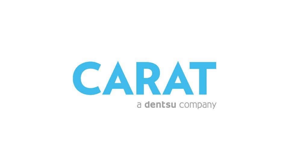 Carat a dentsu company logo