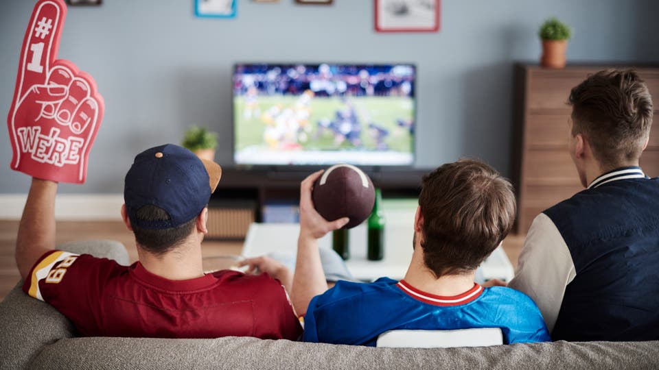 People watching football on TV