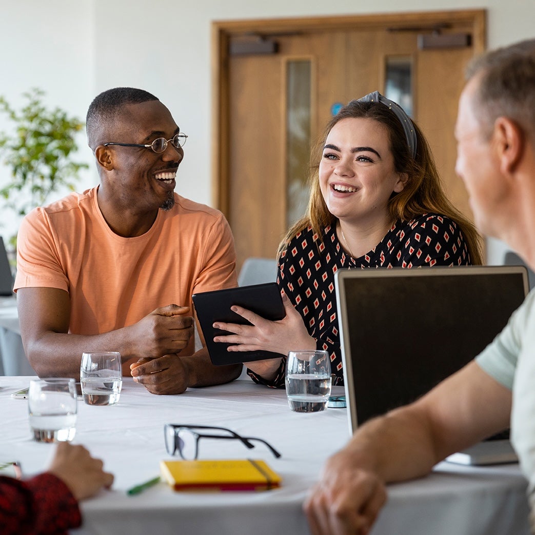 A group of people sitting at a table