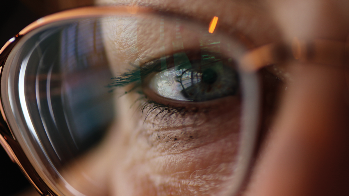 Close up of woman's eye and glasses
