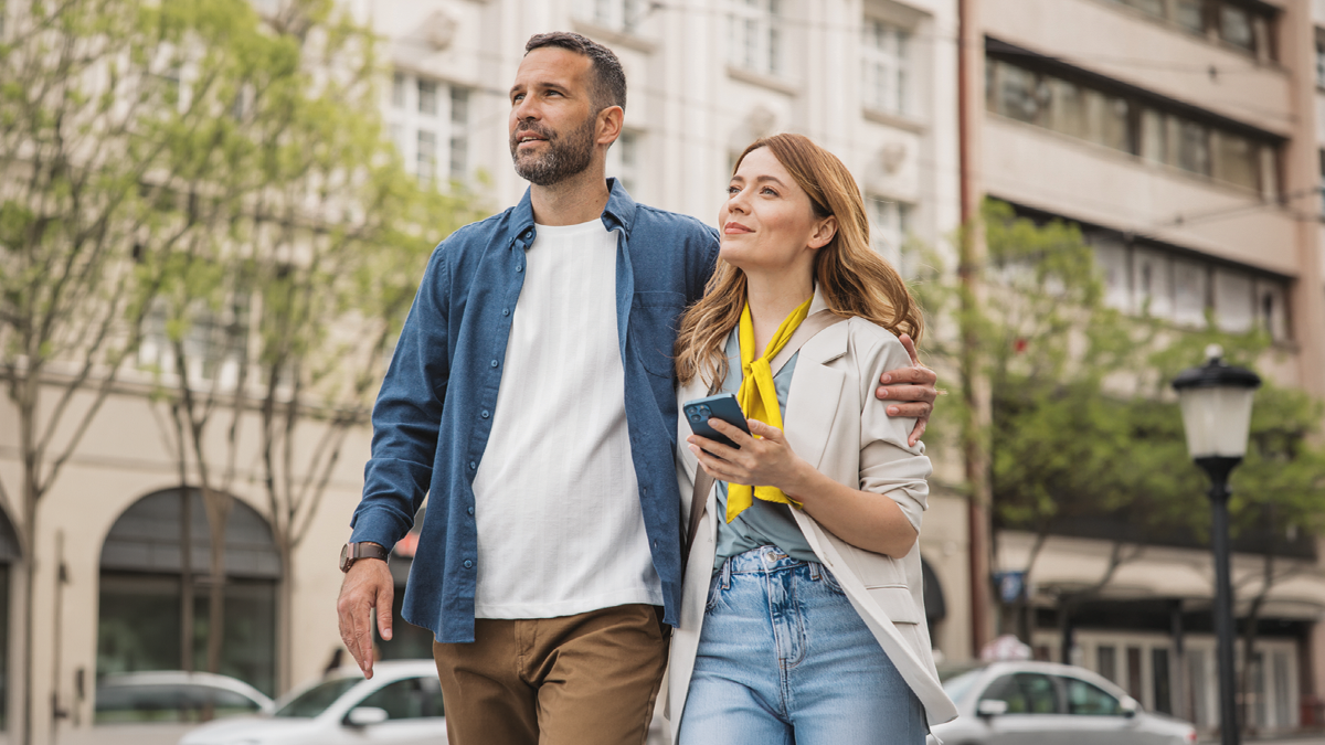 Couple walking down the street