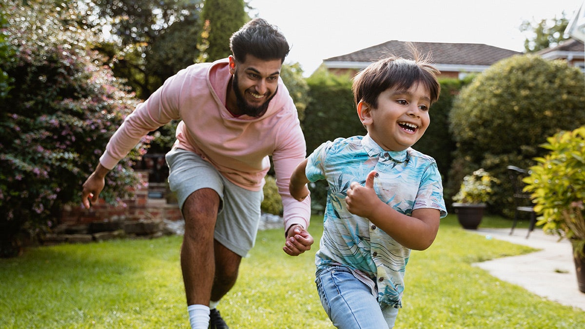 Father and son playing