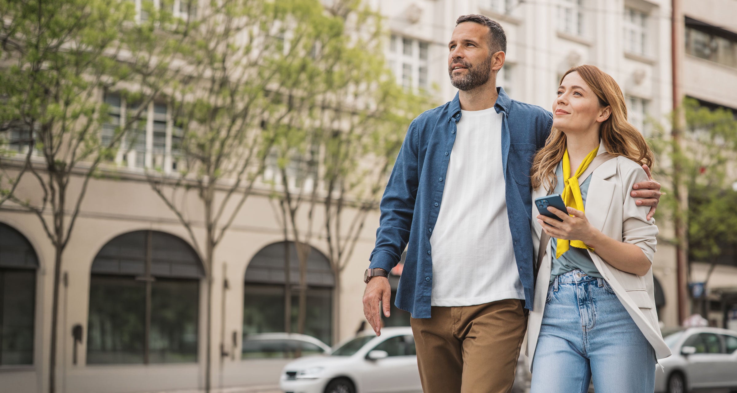 Happy couple exploring city
