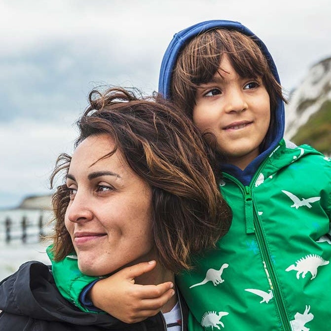 A woman and child posing for a picture