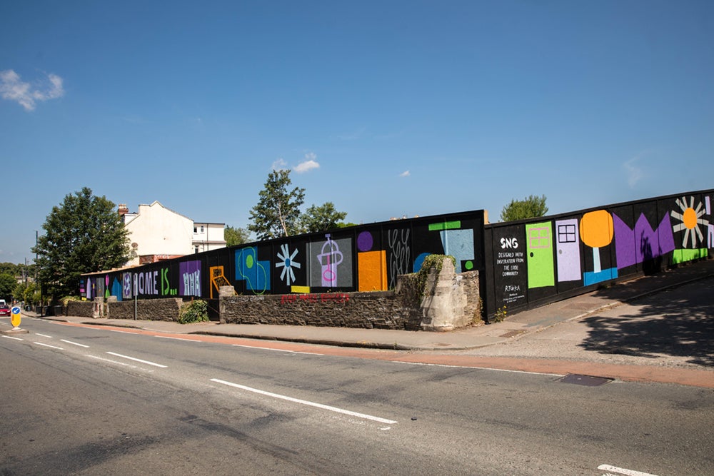 Bath Road - Complete view of vibrant mural on development hoarding, inspired by community drawings.