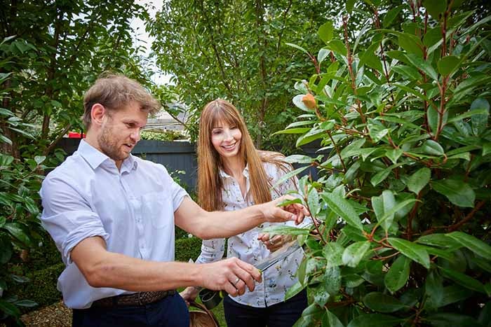 2025 In Bloom winner Sophie Newman showing SNG's Henry Palmer her garden.