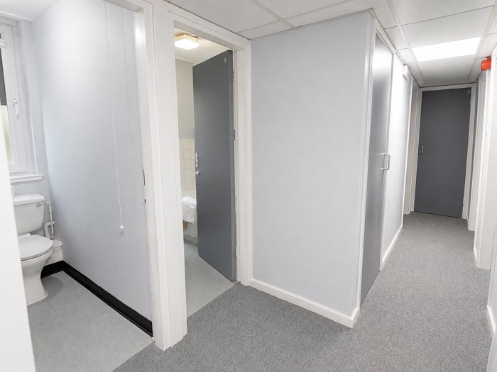 Main corridor with access to rooms throughout the property