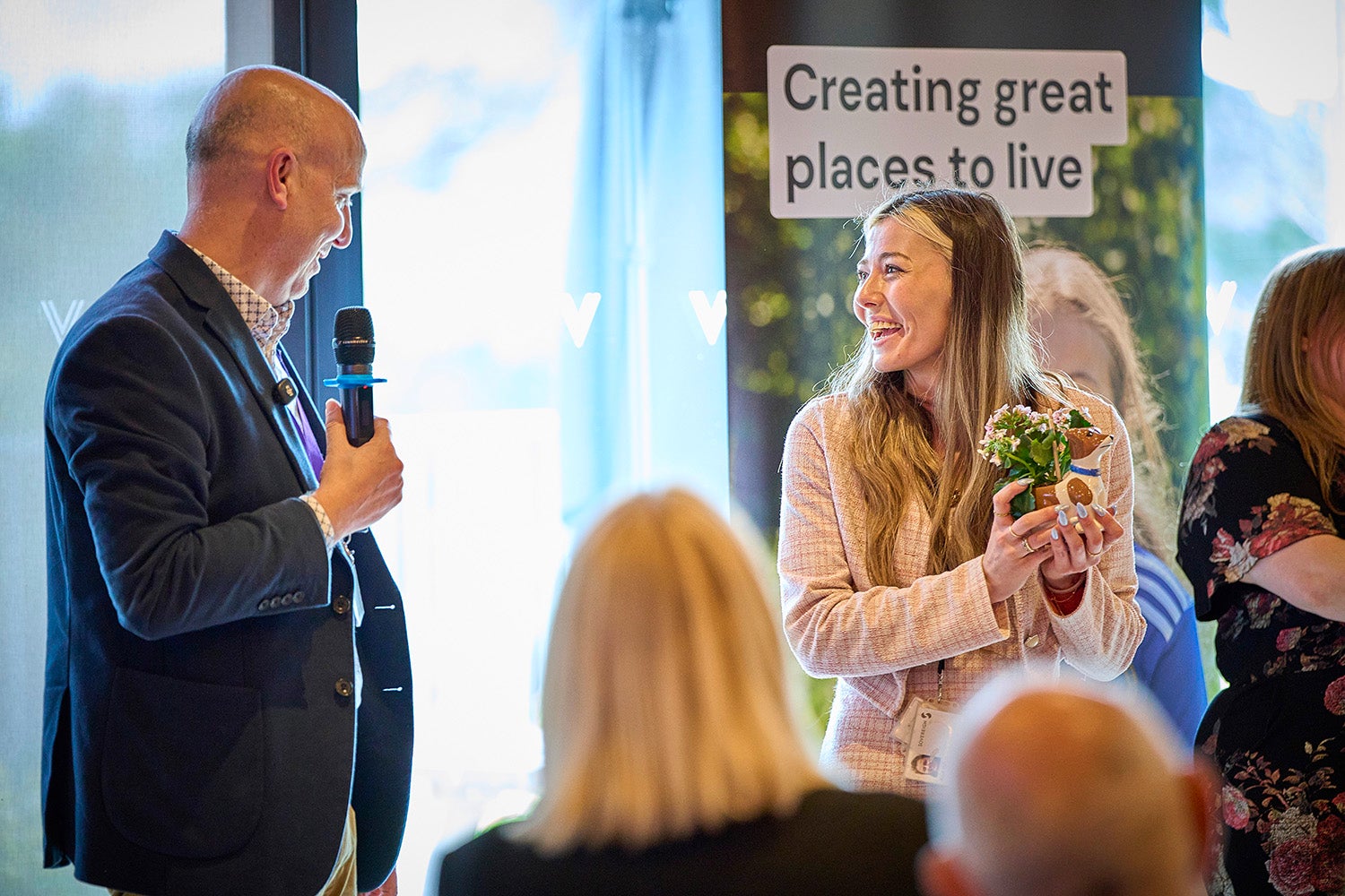 SNG colleague receives a gift at the awards