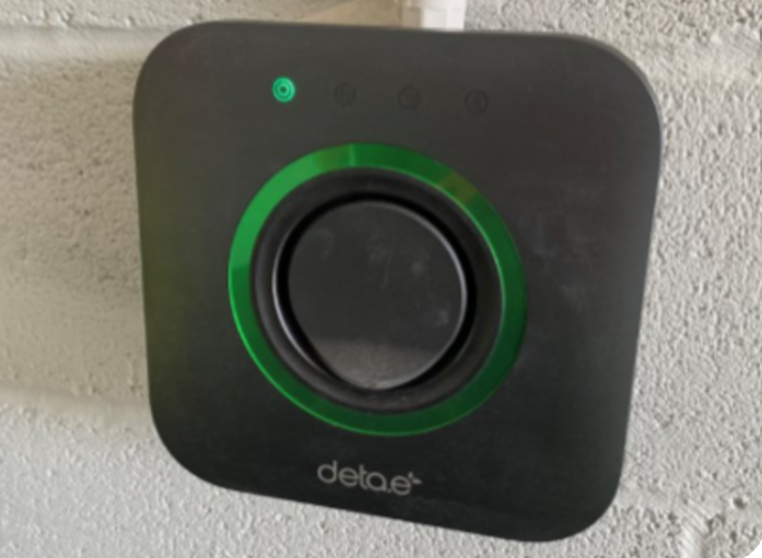 Electric vehicle charging point in a garage