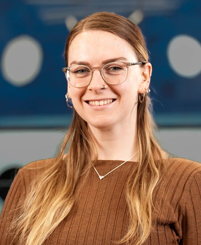 The portrait headshot of a woman