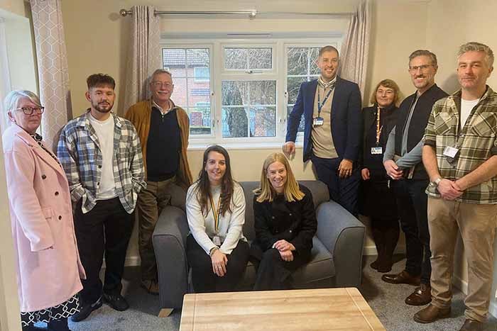 Representatives from SNG, Dorset Council and iDirect in the new property’s kitchen
