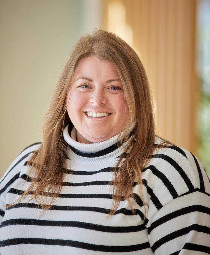 A headshot of a woman