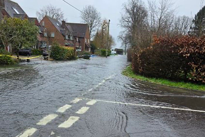 A road that's been flooded with rain water
