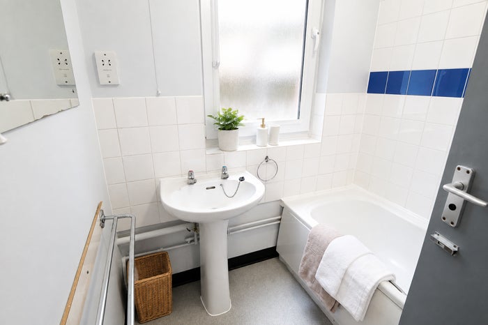 Shared bathroom with bath, shower, toilet and wash basin