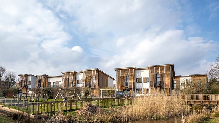 A modern residential development set in a landscaped, semi-natural environment.

