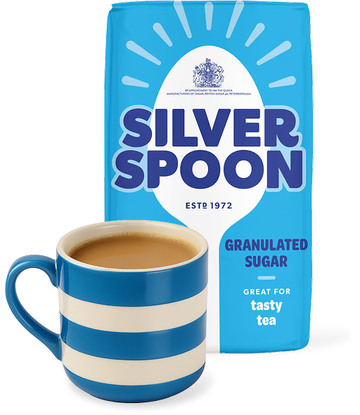 A blue pack of Silver Spoon granulated sugar with a blue and white stripey mug placed to the front/ left of it.