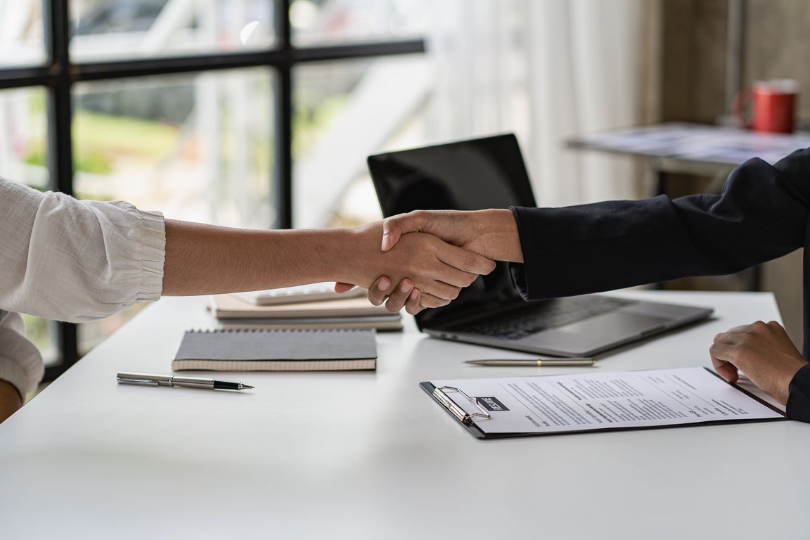 Handshake of new recruit