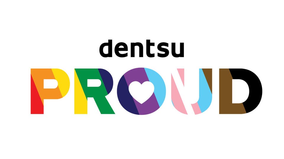 dentsu Proud logo in black with heart