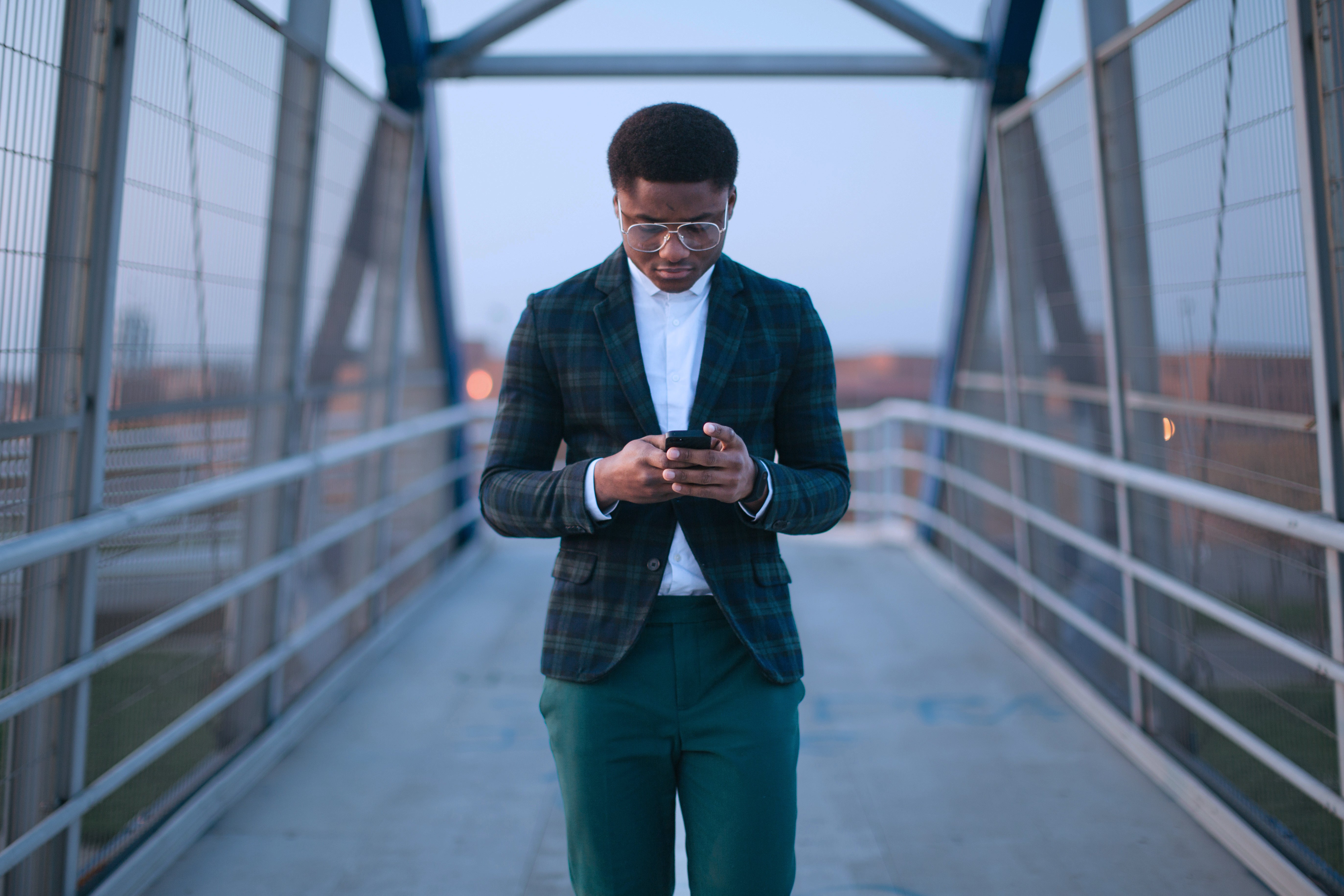 Man looking down at phone