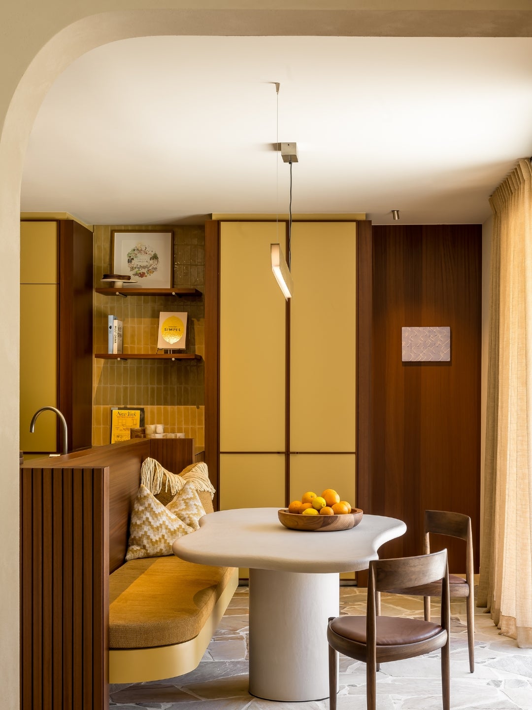 Kitchen interior - warm interior - cosy - wood veneer - wood interior - table - ochre yellow