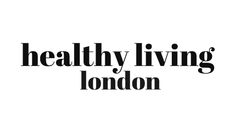 the healthy living london logo in black on a white background