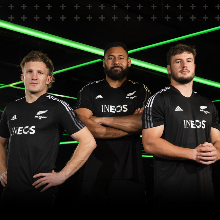 a banner for the go humans academy featuring members of the all blacks