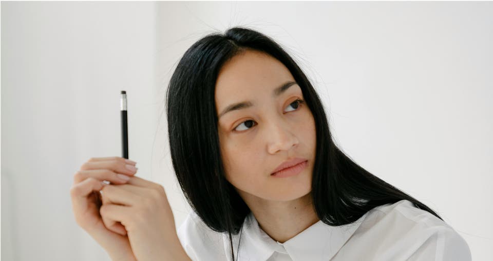 Image: Opinionated Protector: Affluent Female Archetype with Pen.