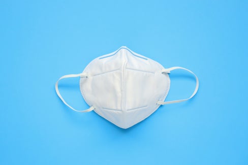 Mund-Nasen-Schutz – Symbol für den Kampf gegen Corona