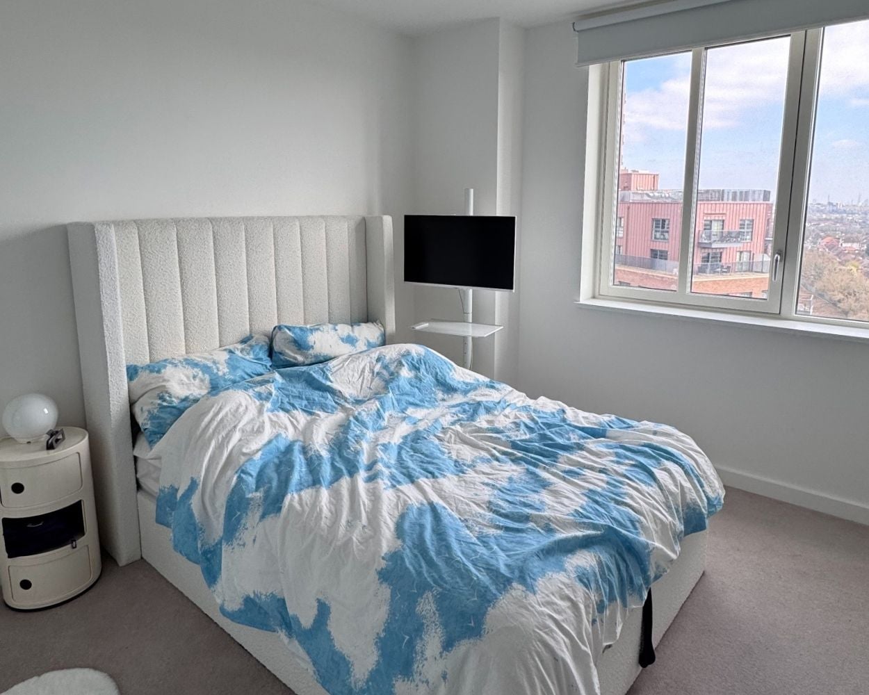 Photo showing the spacious bedroom with a double bed