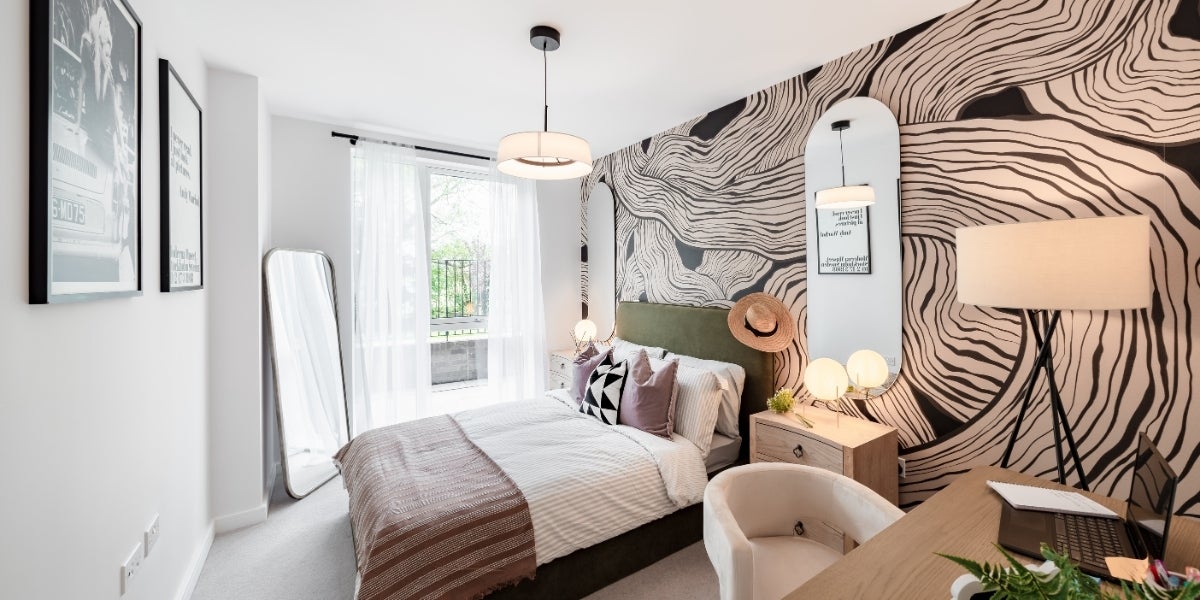 Photo of bedroom with double bed and wallpaper at Northwick Parkside