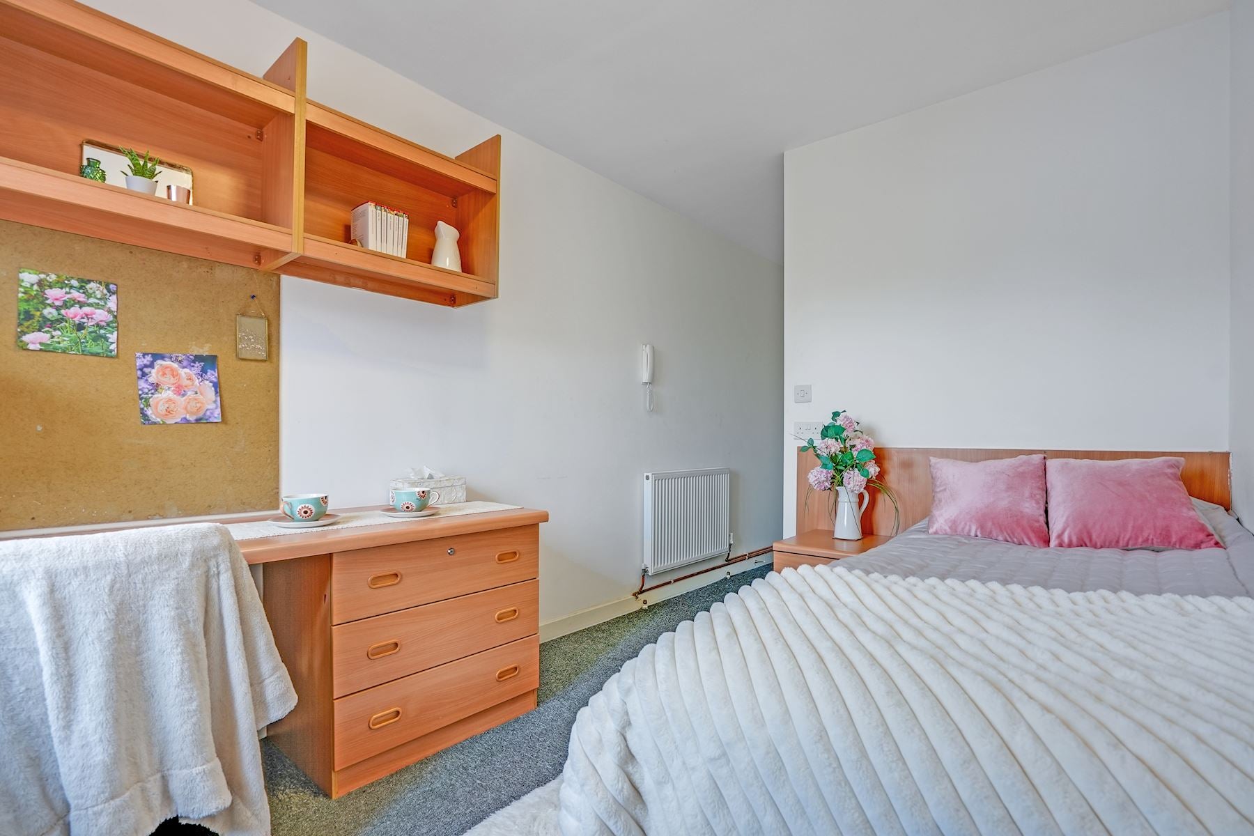 View of bed and desk in room at Barnard House