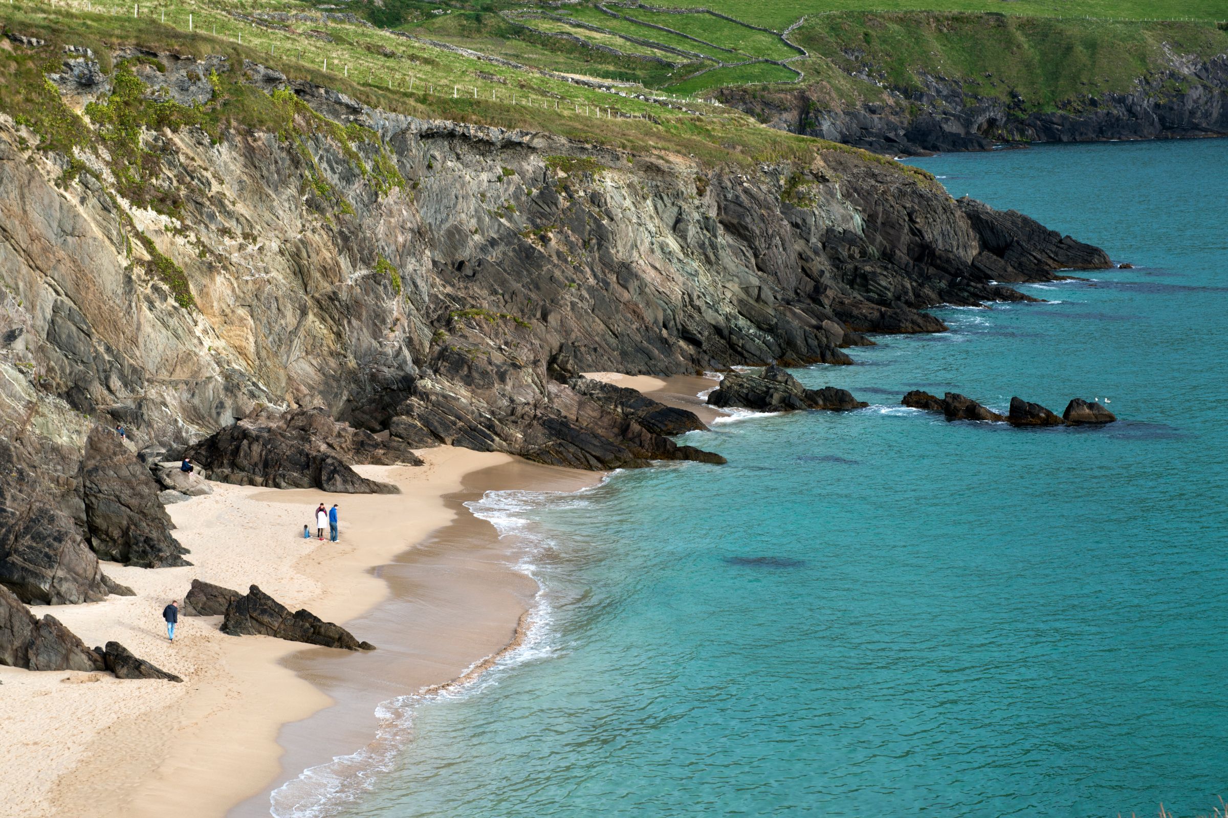 People on the golden sands of the Blasket Islands