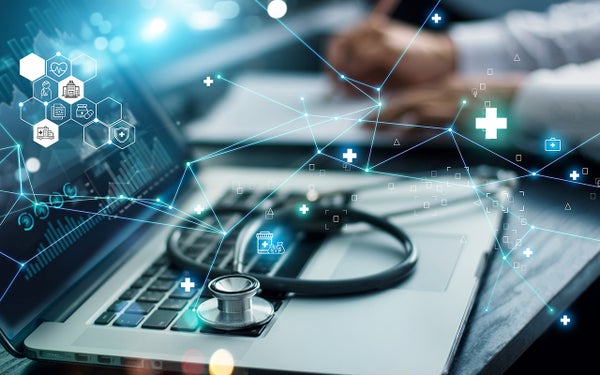 Laptop en stethoscoop