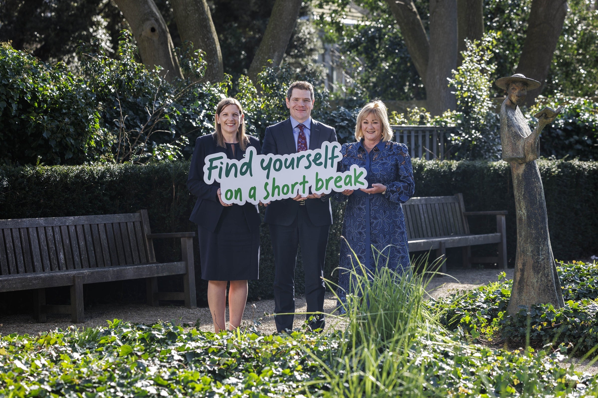 Minister for Tourism Peter Burke TD and Caroline Bocquel, CEO of Fáilte Ireland hold a sign with Short Break campaign slogan.