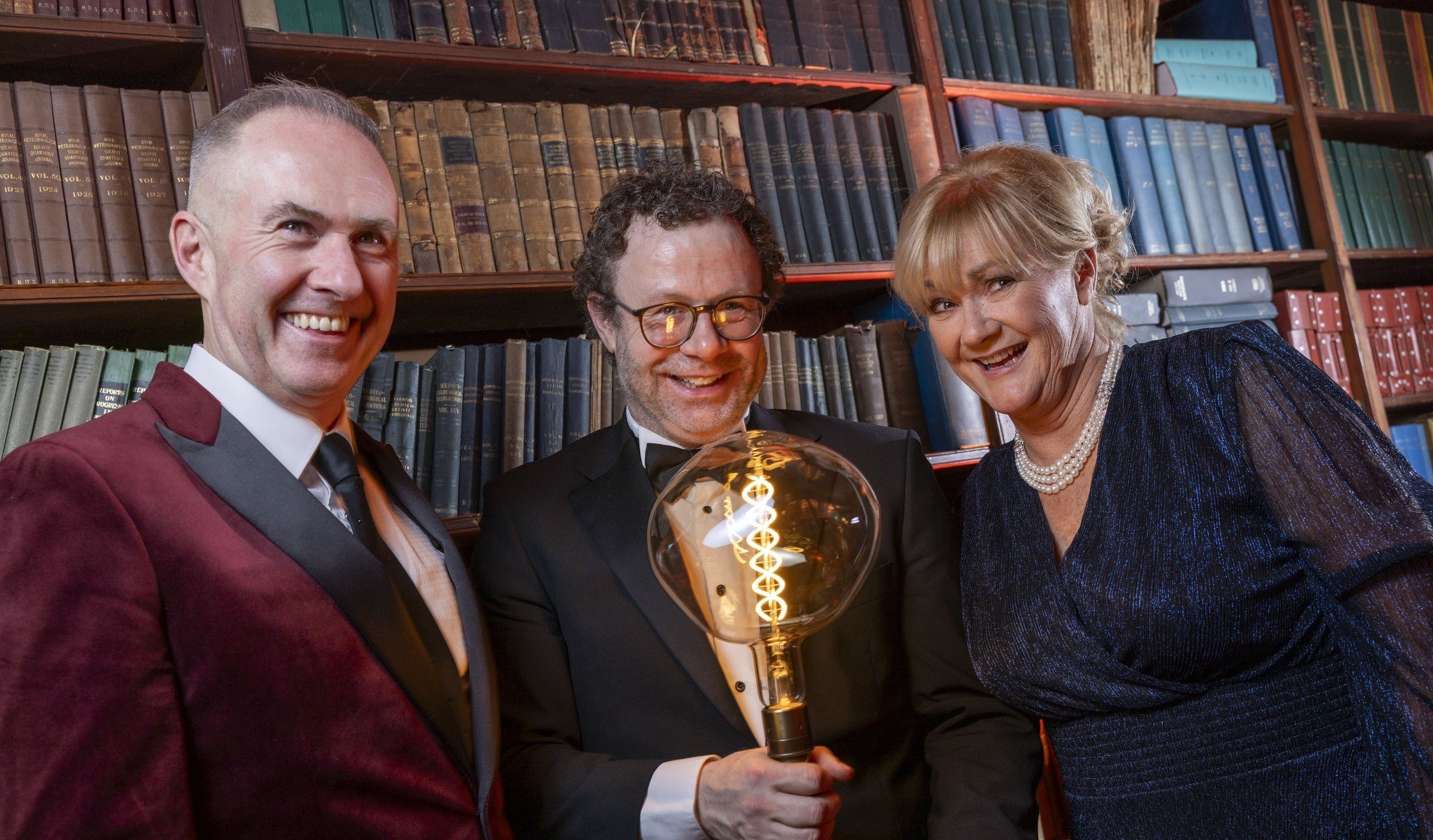 Sector leaders who won an award hold their award.