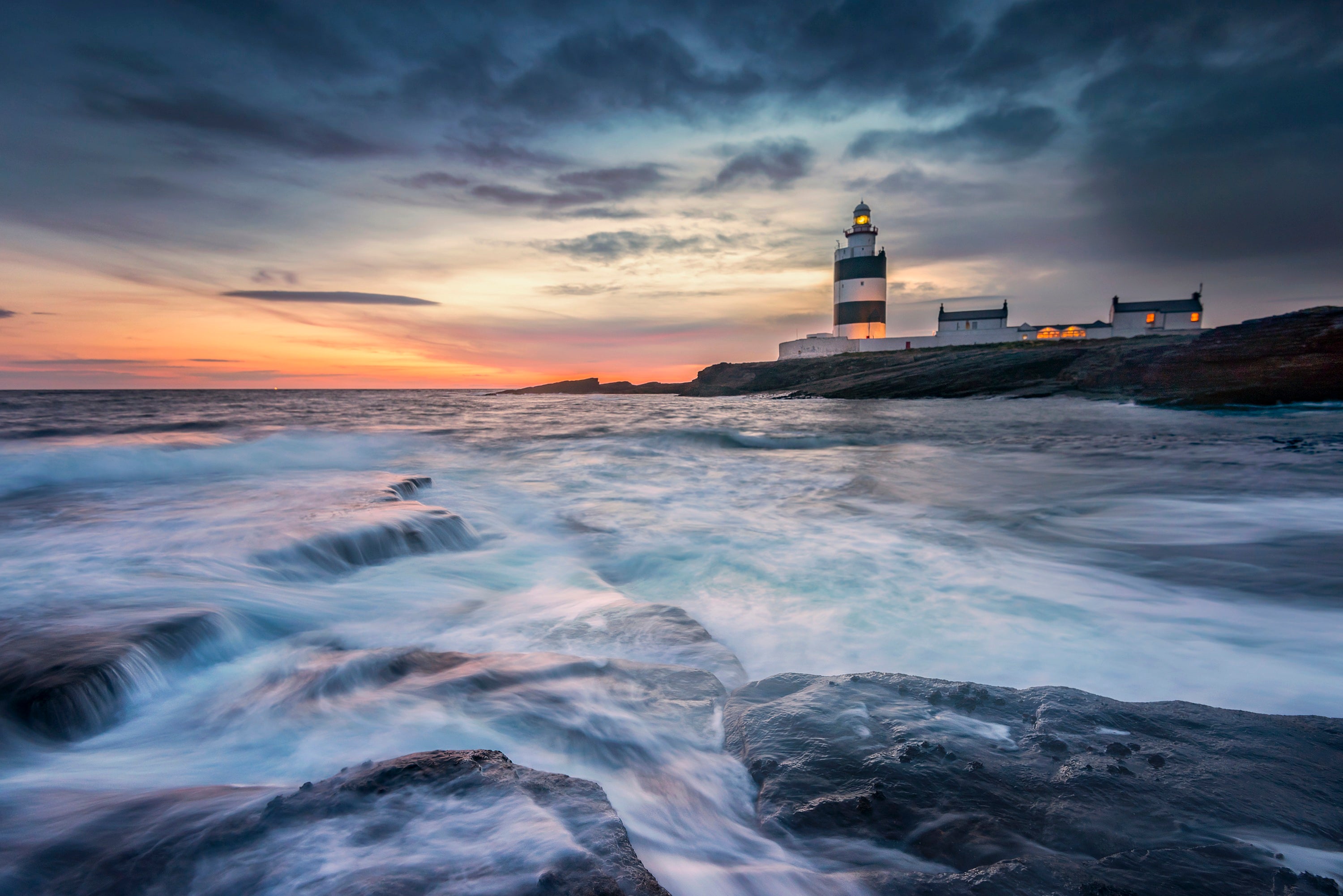 Hook Head lighthouse on a rocky shore