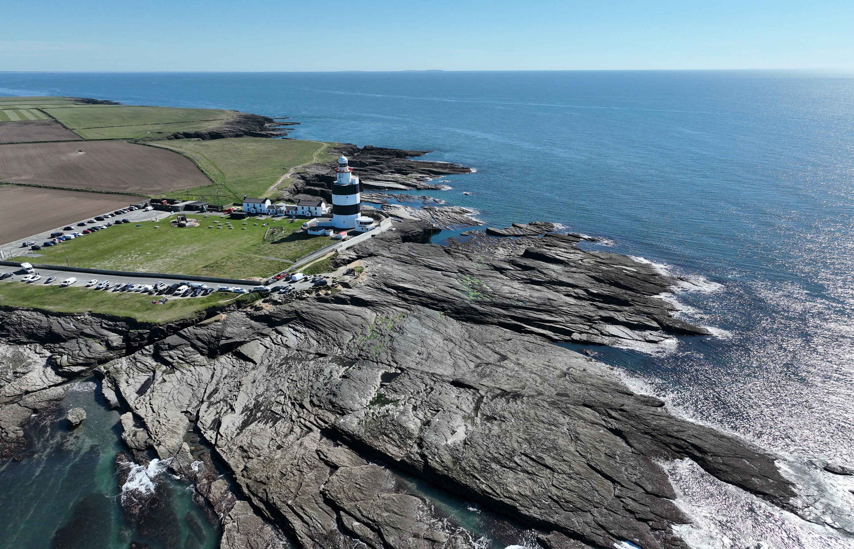 A lighthouse on a rocky shore