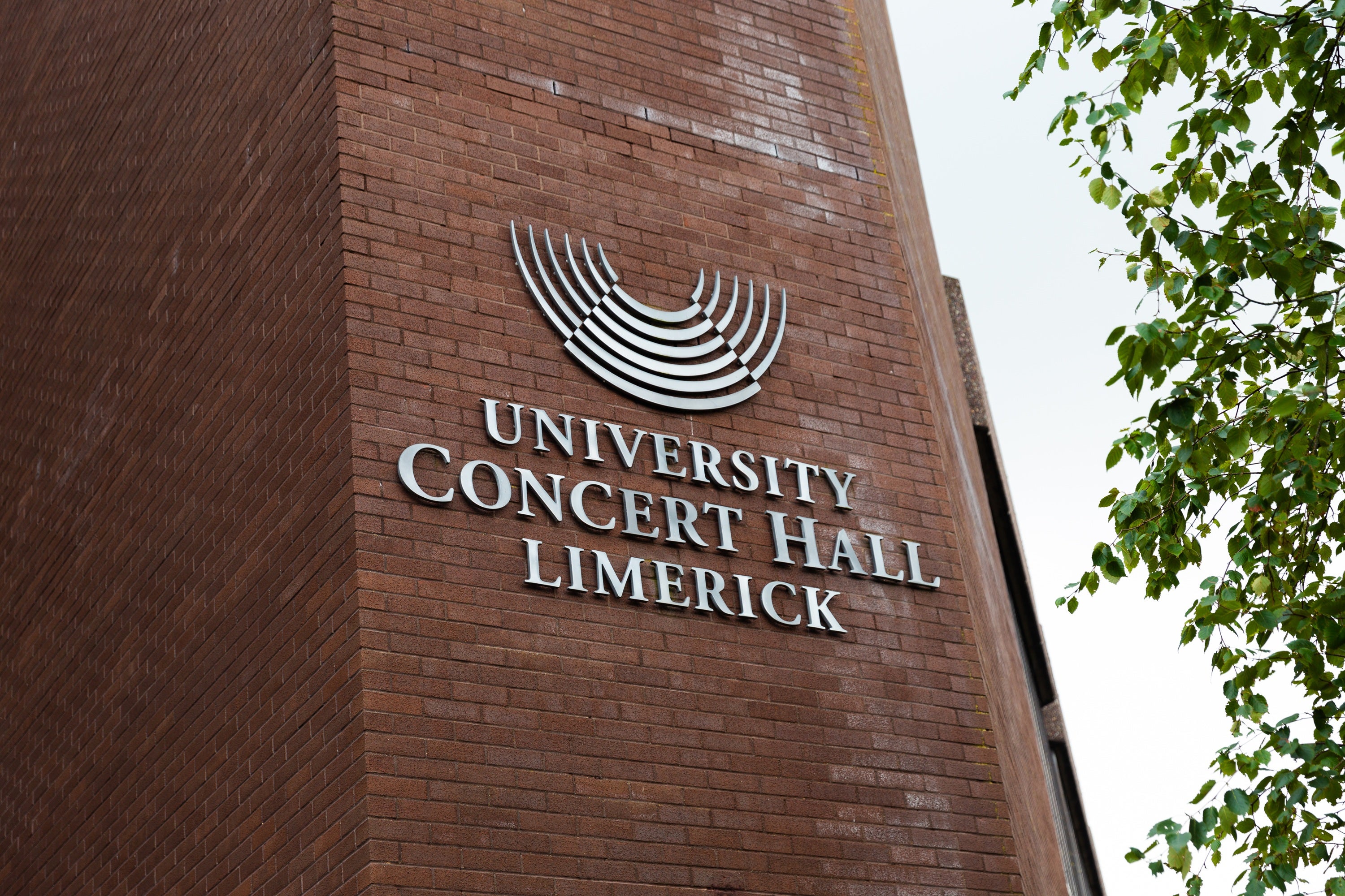 University of Limerick campus with conference impact story branding