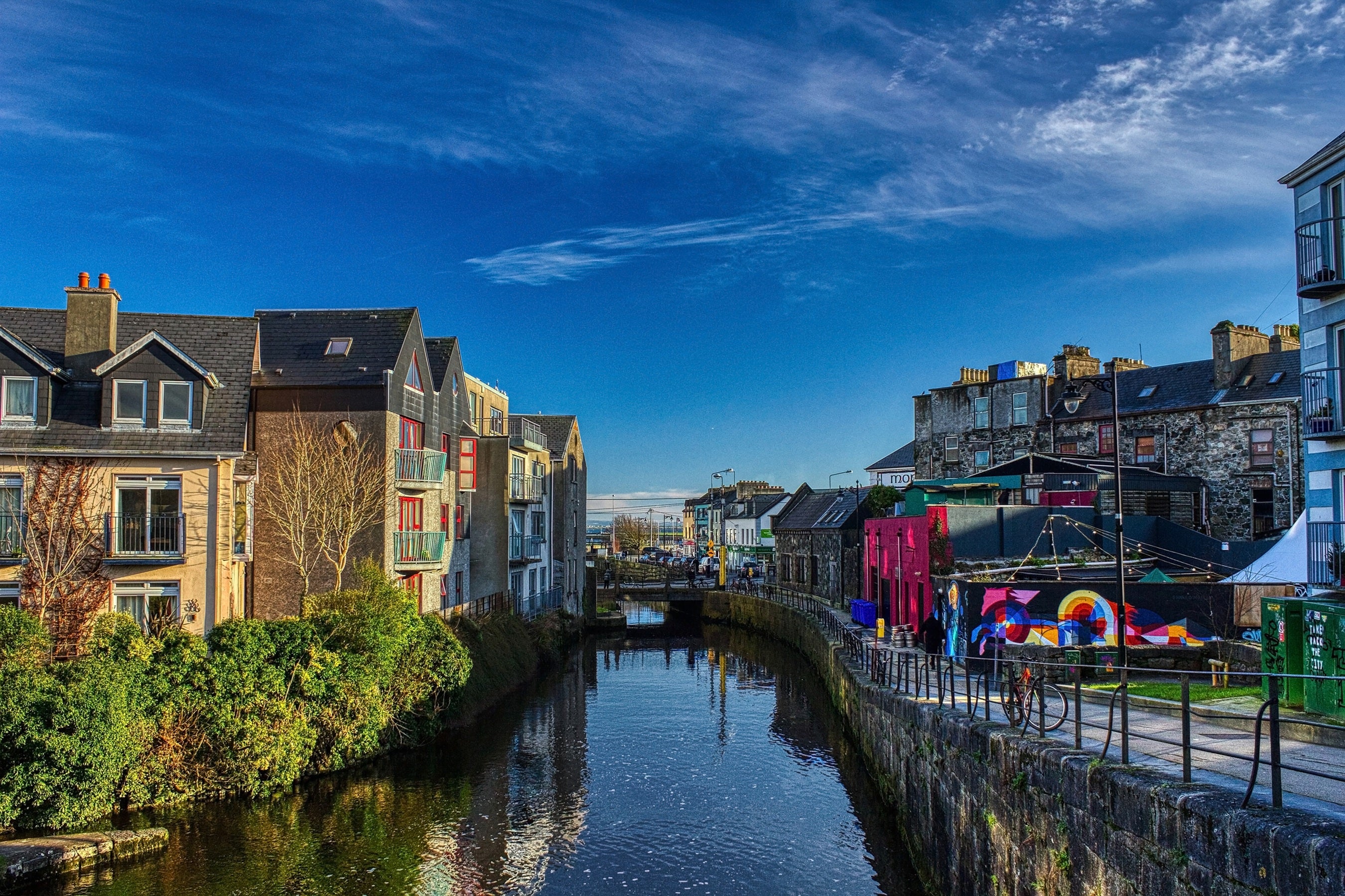 A canal with buildings and a bridge