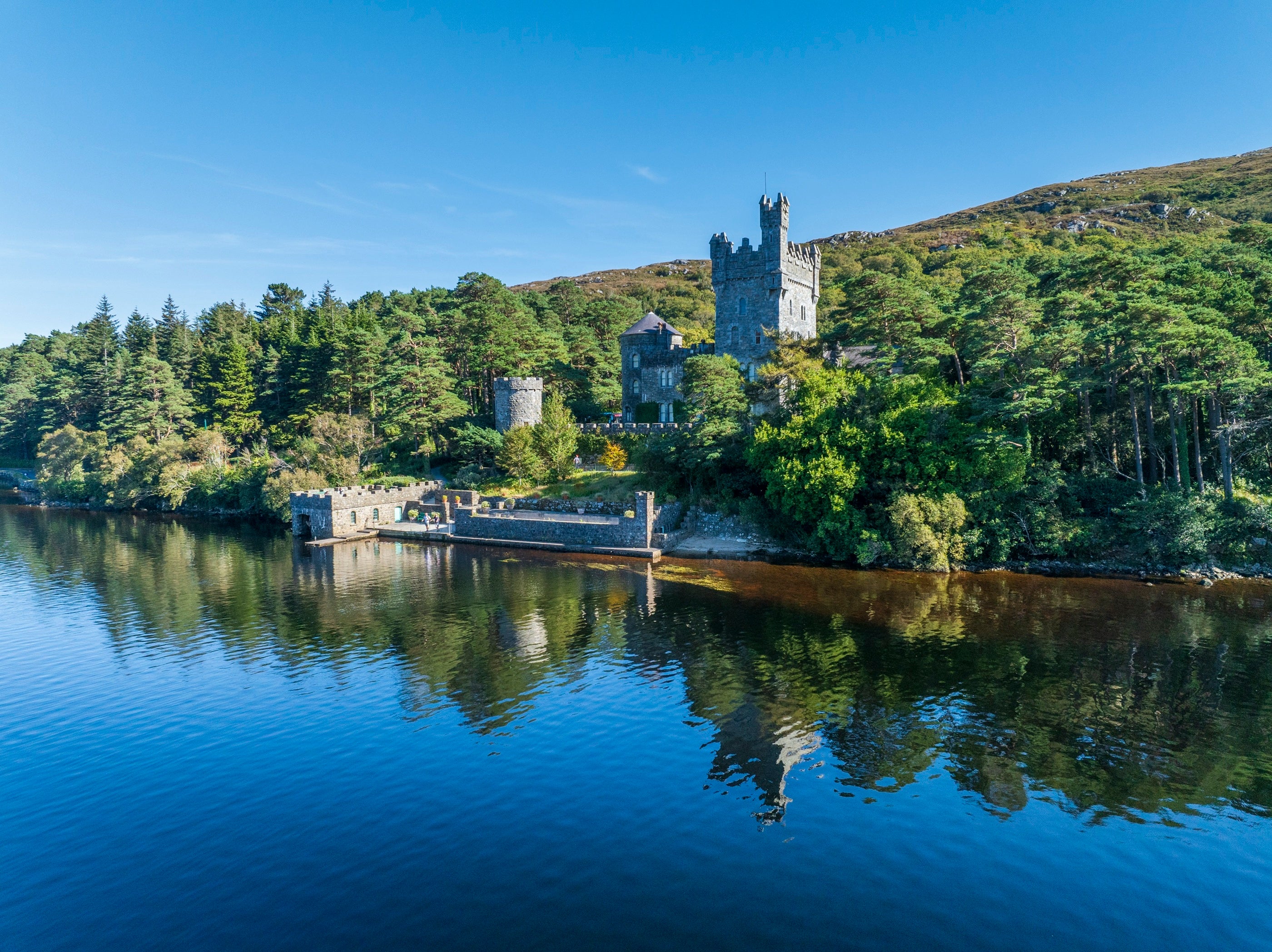 A castle on the hill by a lake