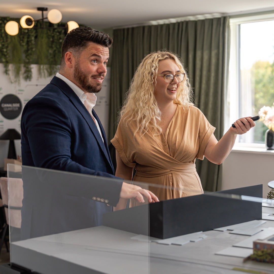 a couple learns about shared ownership