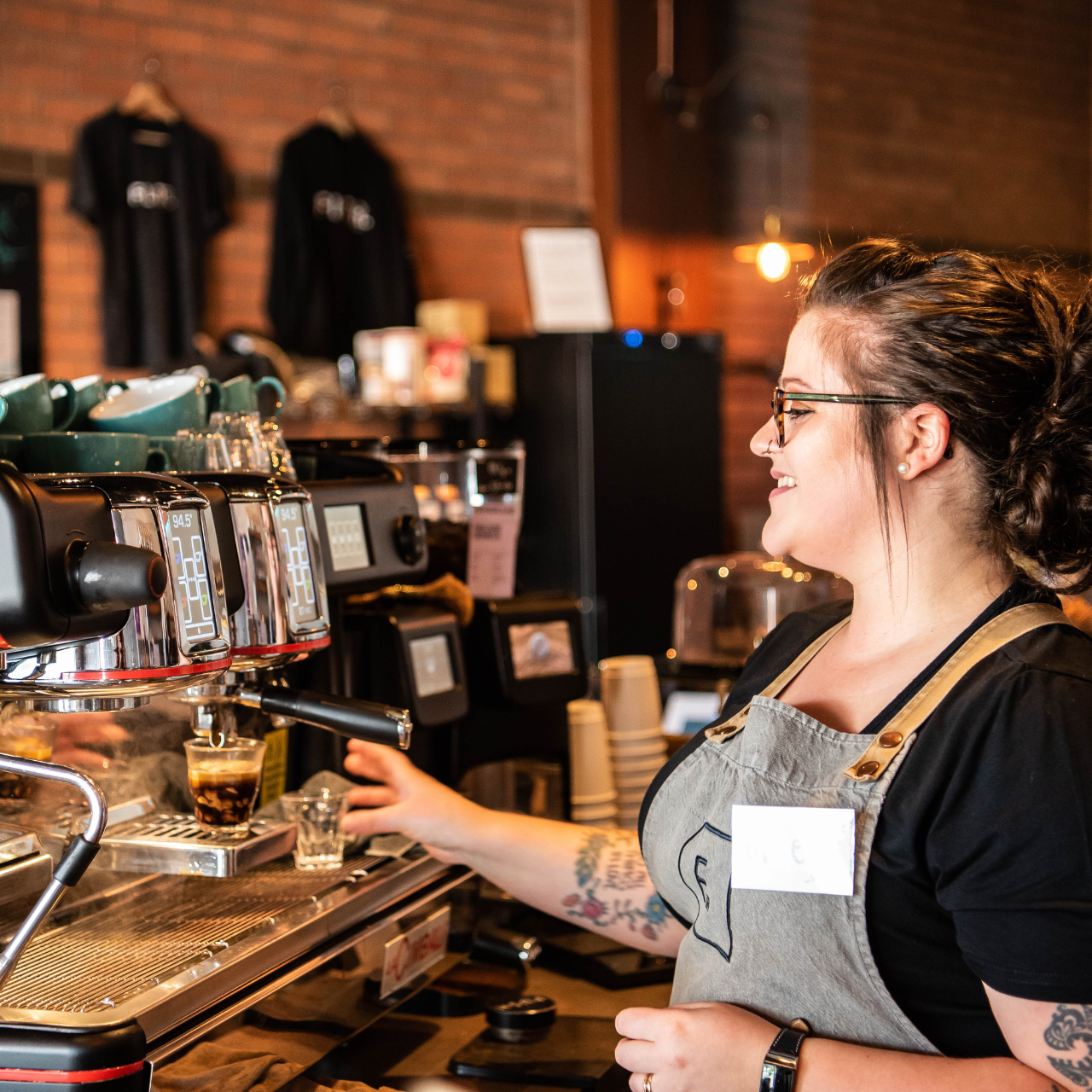 photo of someone making a coffee in bicester