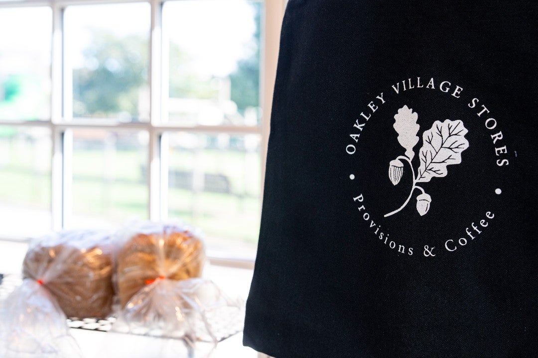 Oakley Village Stores and café, providing everyday essentials and coffee within the village.