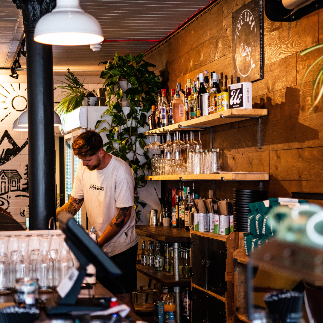 photo of someone behind the bar 