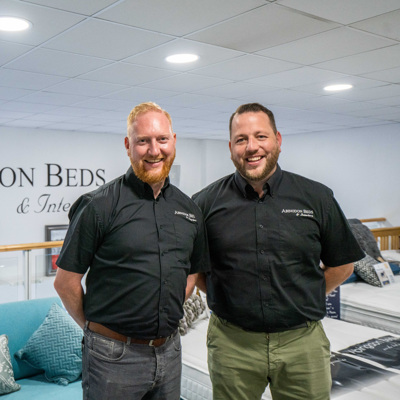 two men standing in the shop 