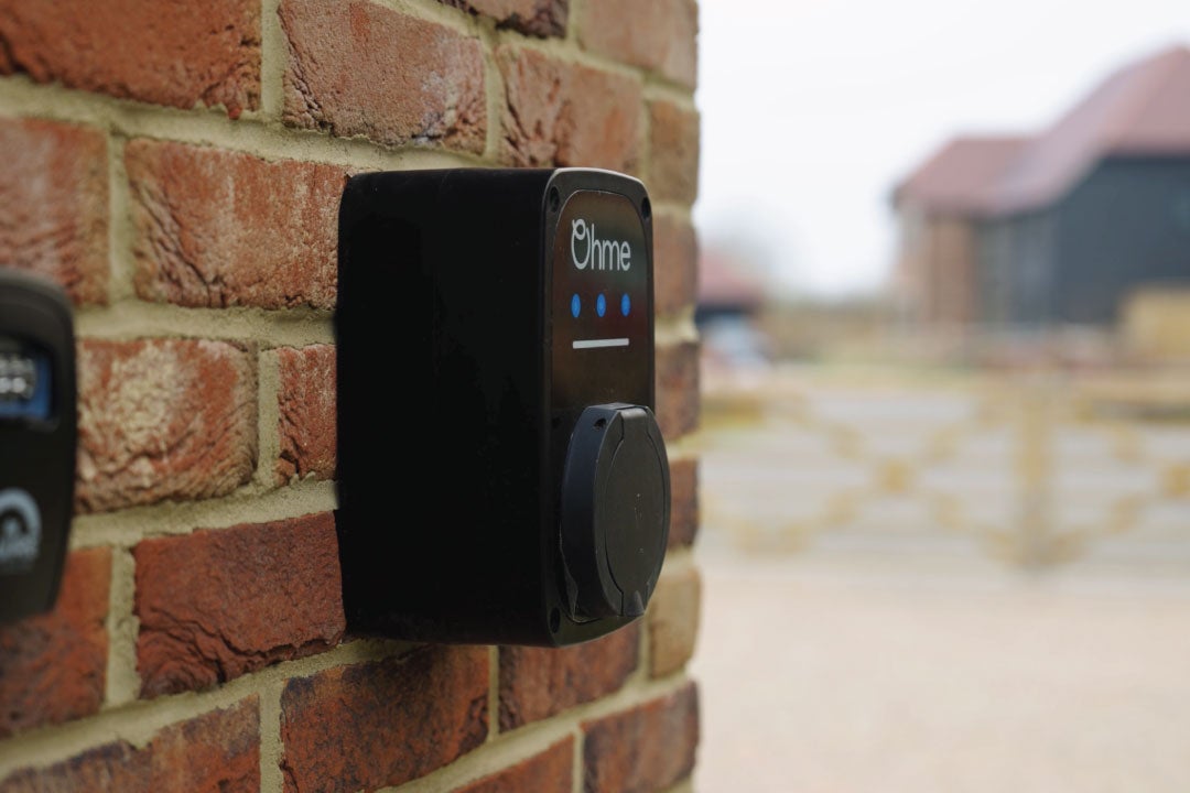 evc point electric vehicle charging point on a house at meadow view buckinghamshire new home