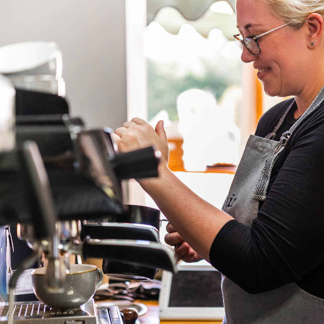 someone making a coffee 